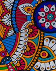 Close up display of rainbow mosaic print dress, fabric.