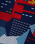 Close up display of multi-colored geometric print dress