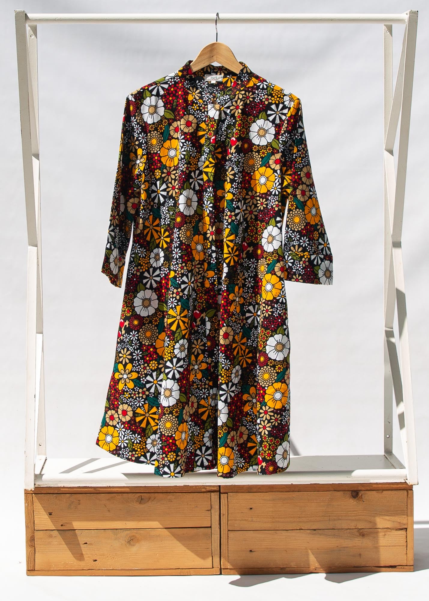 Display of colorful flower print dress