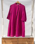 Display of fuchsia dress