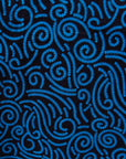 Close up display of blue and black print dress