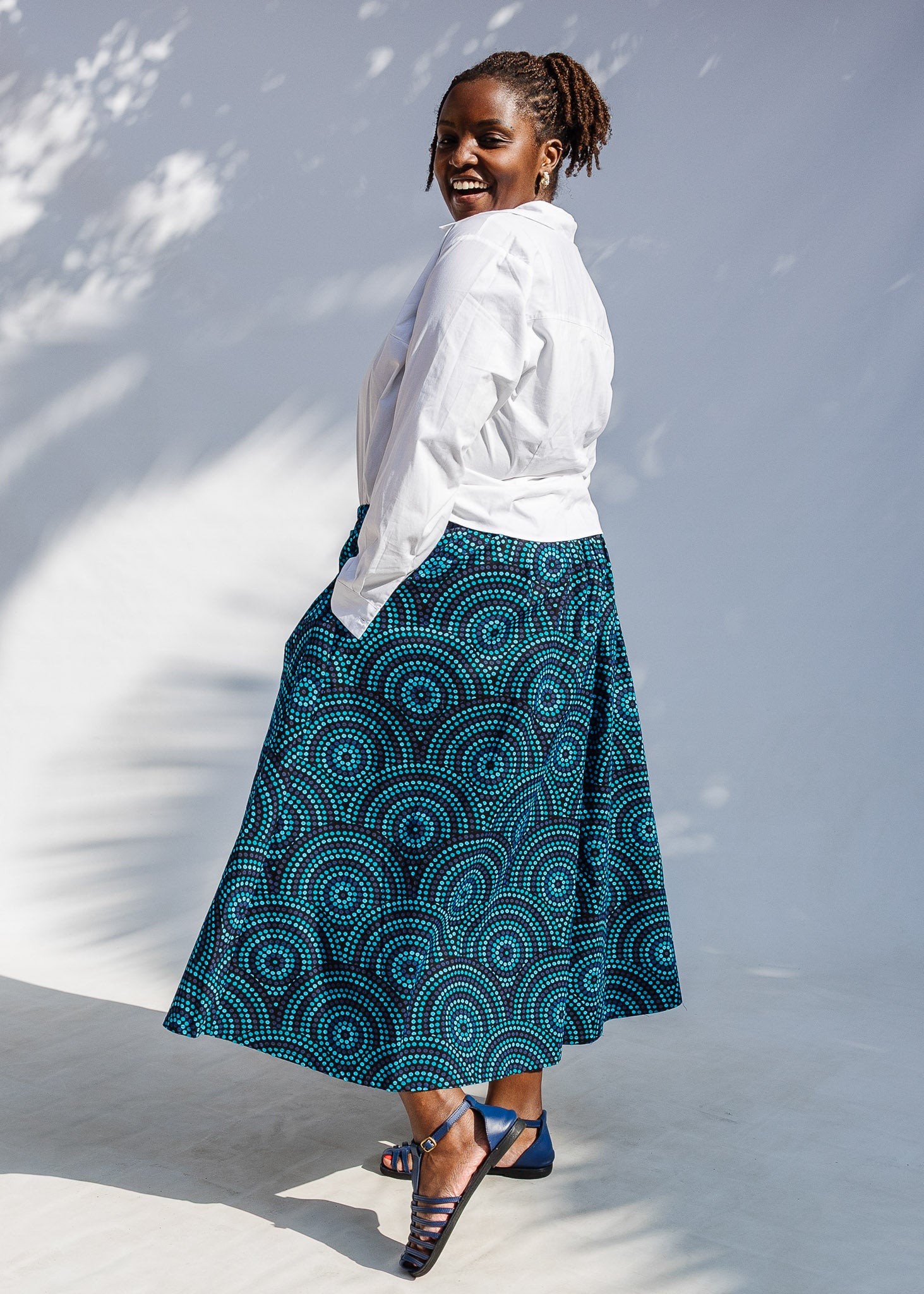 Model wearing blue pants