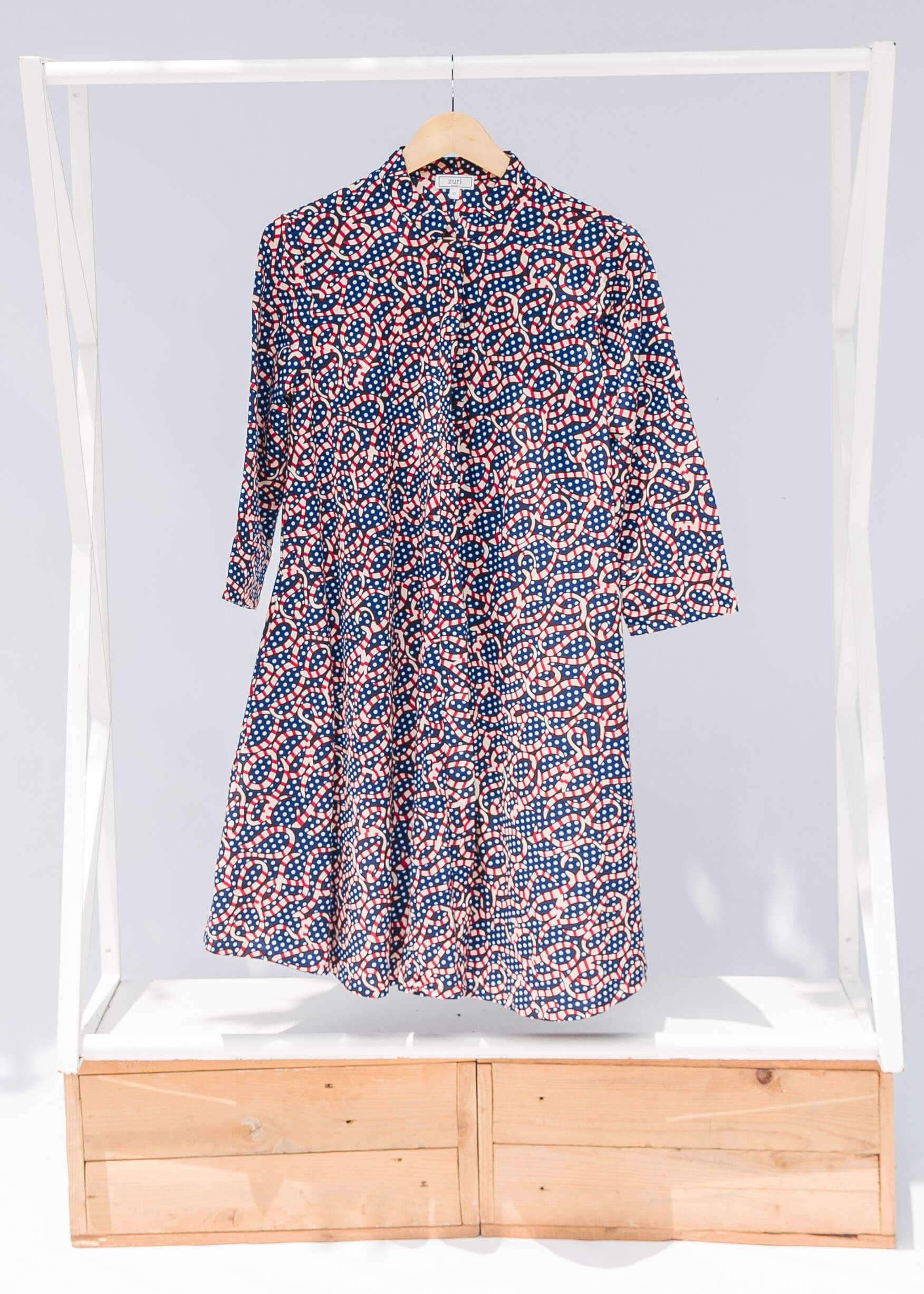 display of blue and red ribbon print dress.