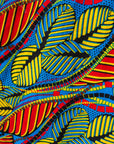 Detail of a colorful rainbow leaves print dress.