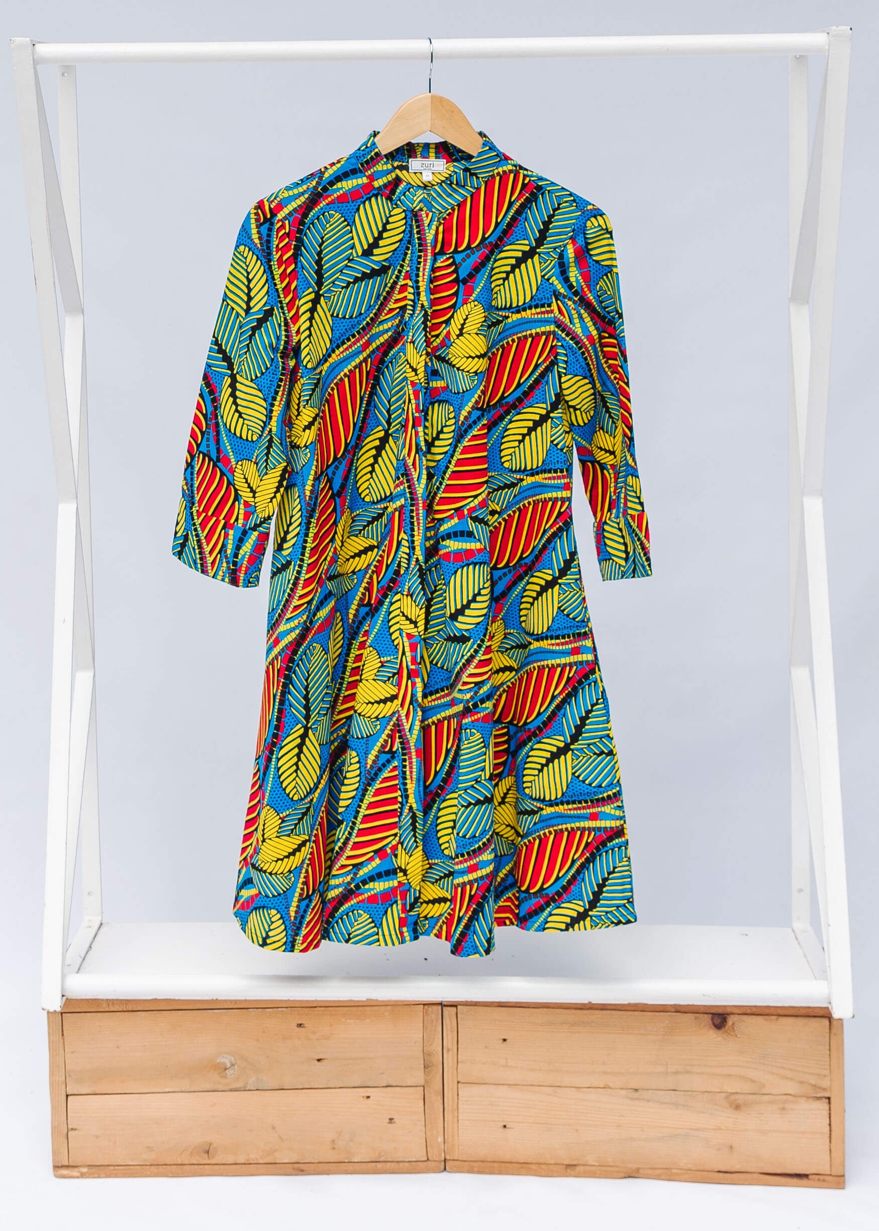 A colorful rainbow leaves print dress.