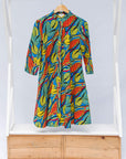 A colorful rainbow leaves print dress.