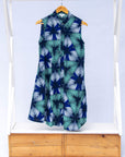 Display of blue, white, and green, geometric print dress.