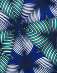 Display of blue, white, and green, geometric print dress.