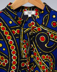 The display blue, red, black, yellow and white ornamental print dress 