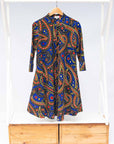 The display blue, red, black, yellow and white ornamental print dress 