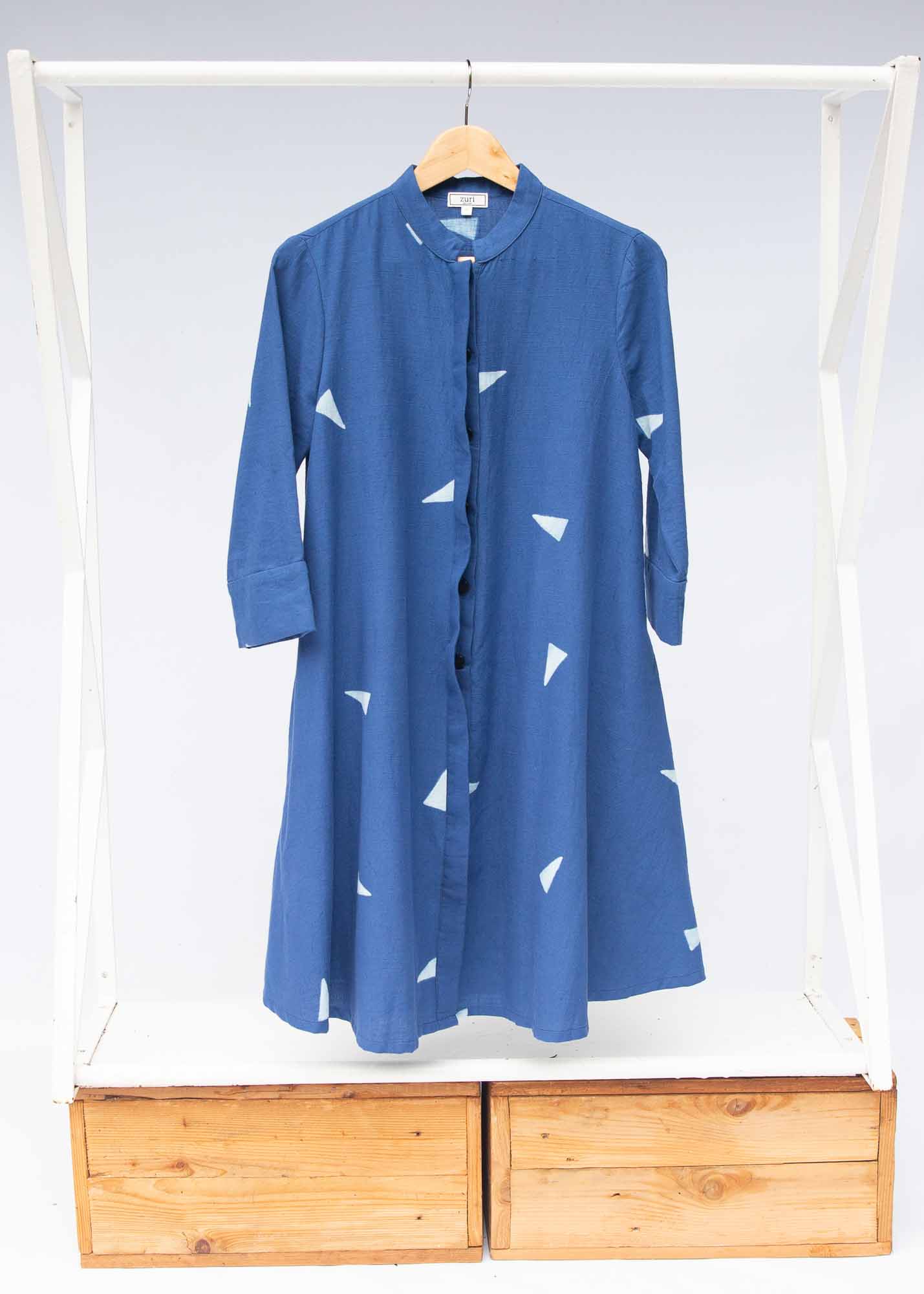 The display of blue sold dress with white triangles