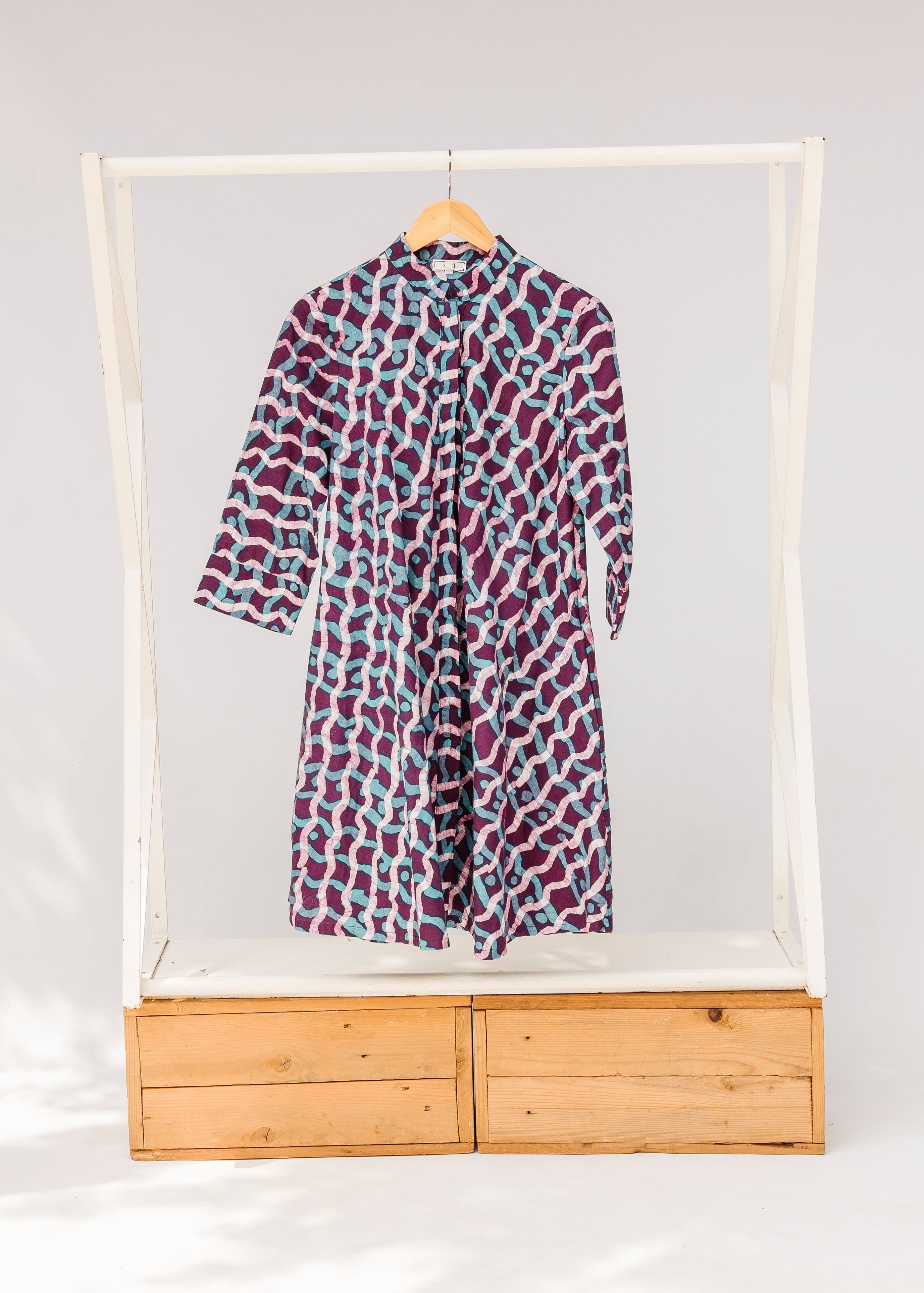 Display of purple and blue batik dress.