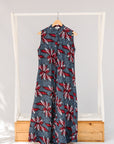 Display of grey, red and black dragonfly print dress.
