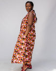 Model wearing geometric print dress.