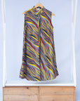 Display of  multi-colored abstract print dress