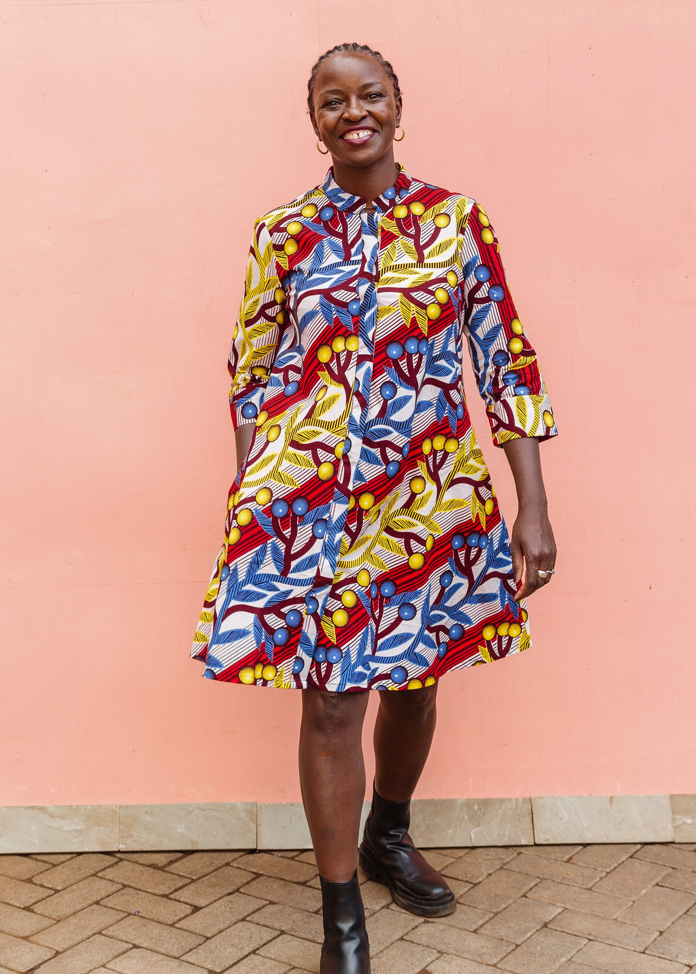 Model wearing rainbow vine print dress.