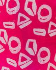 display of a pink and white geometric print dress