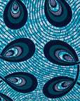 Close up display of blue dress with loop print, fabric.